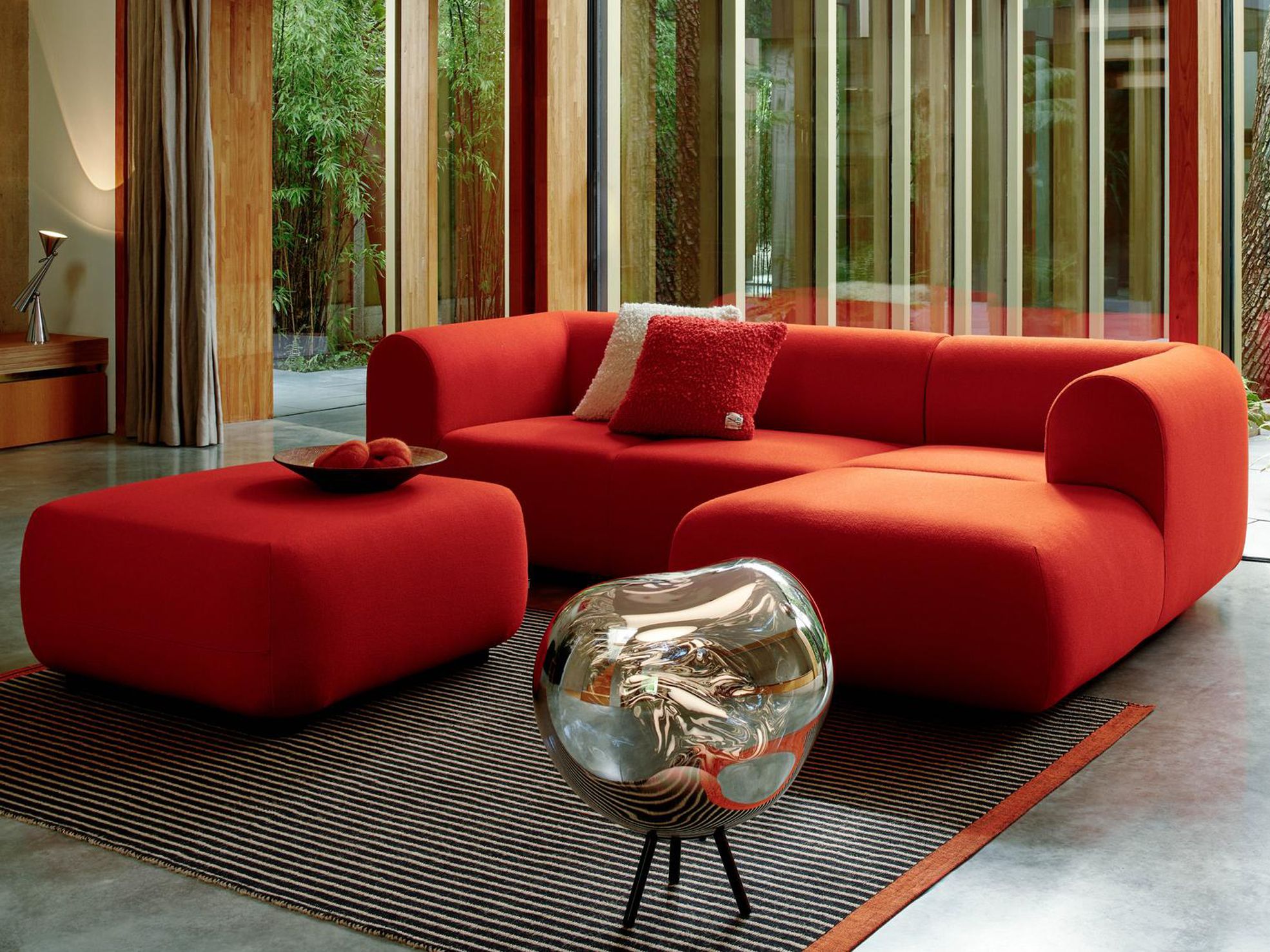Tom Dixon Fat sofa and Melt floor light in a sunlit living room