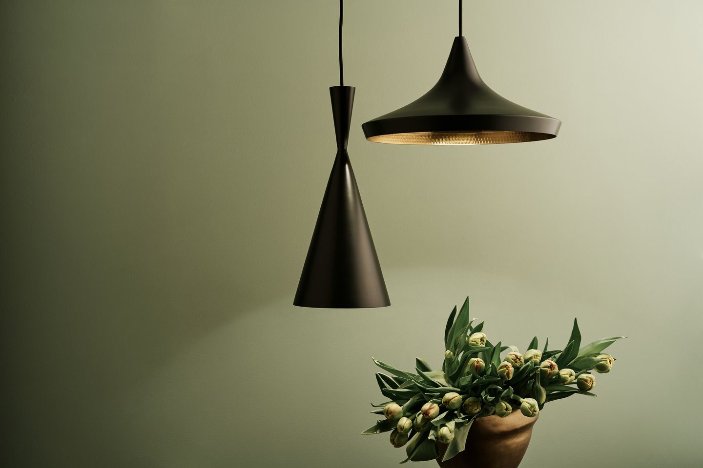 Tom Dixon Beat Tall and Stout pendants in matte black with brass interiors