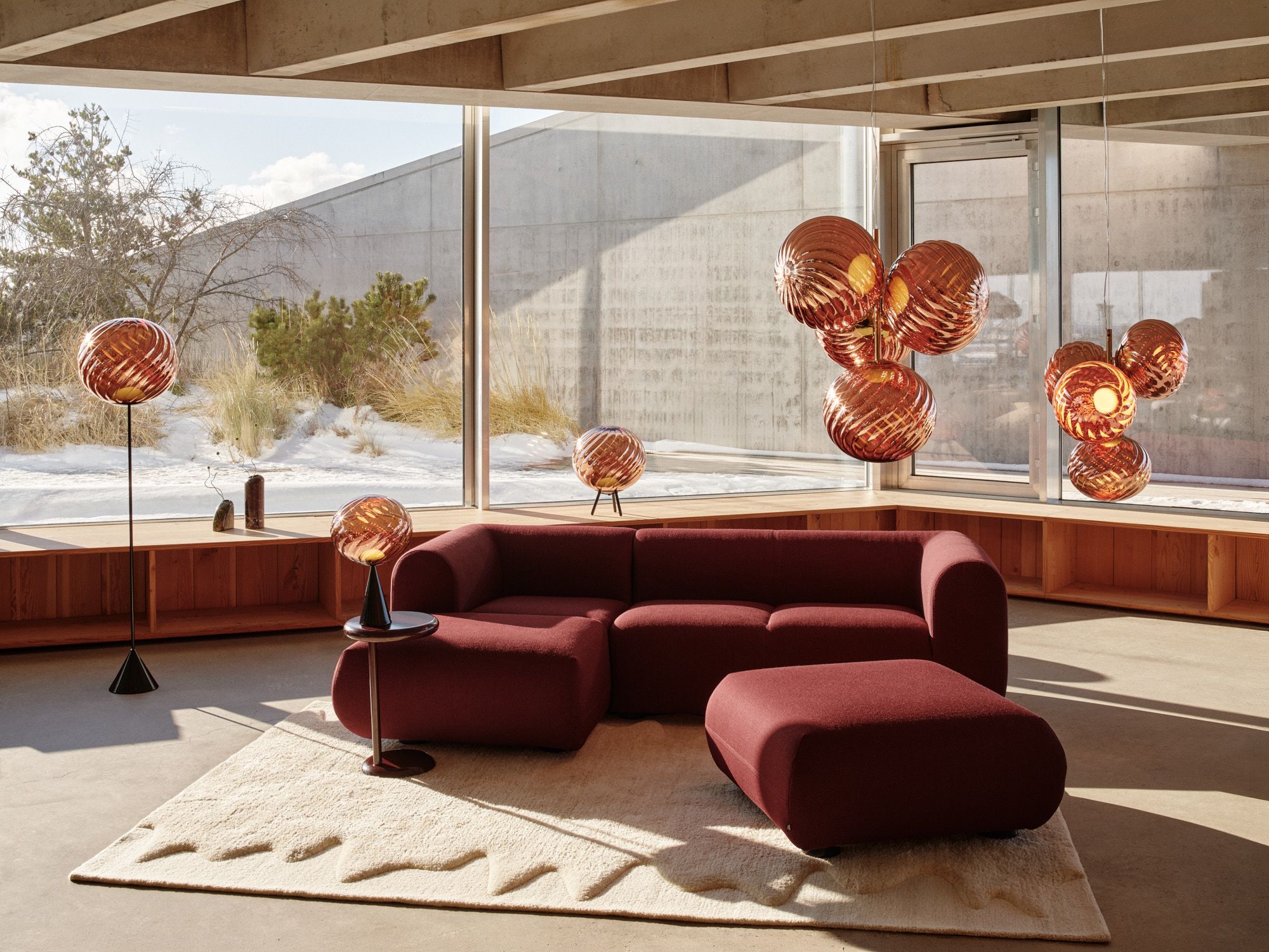 Tom Dixon Melt pendant clusters in a sunlit living room